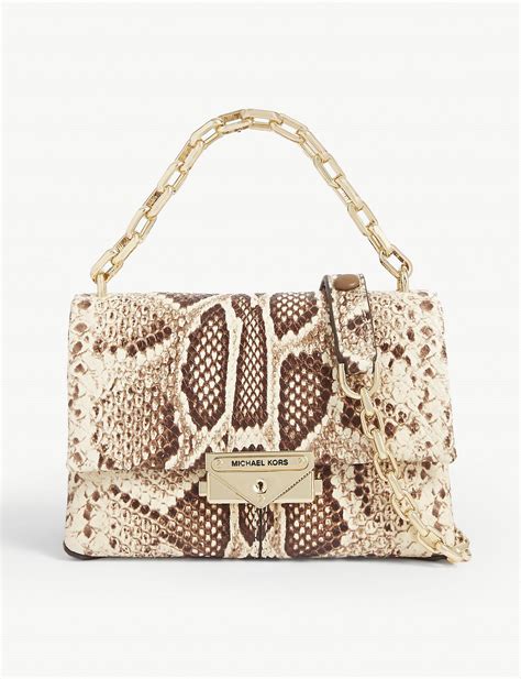 michael kors doris snakeskin &|Michael Kors cece shoulder bag.